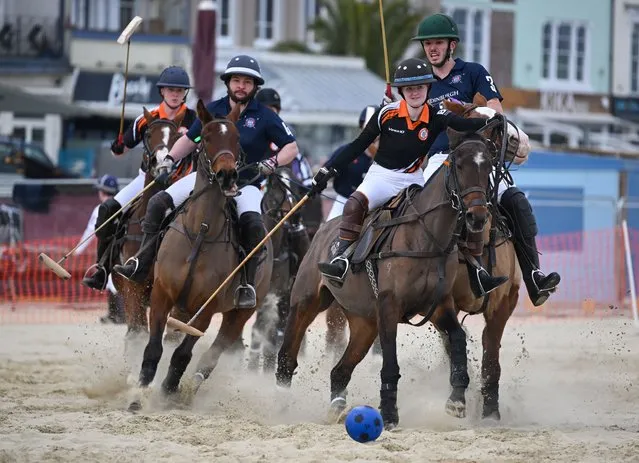 Polo players in action during the University of York Sand Polo event on the beach on March 06, 2023 in Weymouth, England. Competitors from Universities of Edinburgh, York and Bournemouth are taking part. (Photo by Finnbarr Webster/Getty Images)