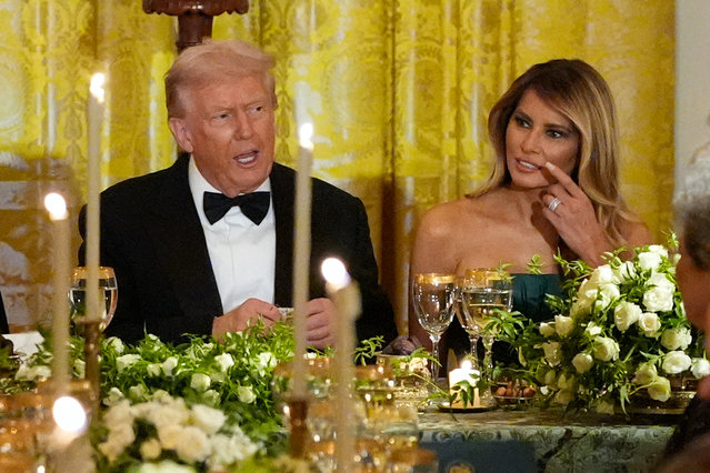 President Donald Trump and first lady Melania Trump attend a dinner with Saudi Arabia's Crown Prince Mohammed bin Salman in the East Room of the White House, Tuesday, November 18, 2025, in Washington. (Photo by Alex Brandon/AP Photo)