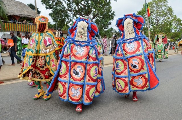 Egungun masks, of the Yoruba people of West Africa, are showcased during a performance in the first edition of the Benin Mask Festival, in Porto-Novo, Benin, on August 4, 2024. (Photo by Charles Placide Tossou/Reuters)