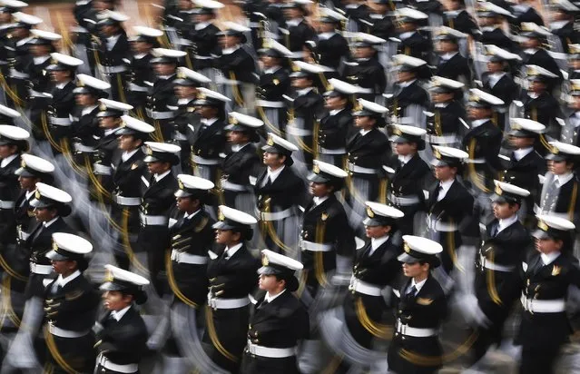 Indian soldiers march during the full dress rehearsal for the Republic Day parade in New Delhi January 23, 2015. (Photo by Adnan Abidi/Reuters)