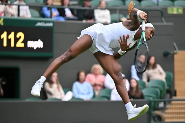 US player Coco Gauff serves to US player Sofia Kenin during their women's singles tennis match on the first day of the 2023 Wimbledon Championships at The All England Tennis Club in Wimbledon, southwest London, on July 3, 2023. (Photo by Glyn Kirk/AFP Photo)