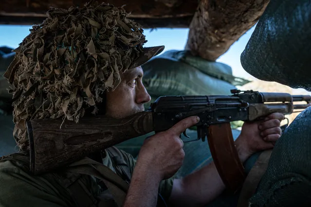 A Ukrainian soldier holds his position inside a trench amid Russia and Ukraine war in Donetsk Oblast, Ukraine on August 17, 2023. (Photo by Ignacio Marin/Anadolu Agency via Getty Images)