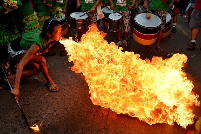 A reveller blows fire during Chinese Lunar New Year celebrations in Manila's Chinatown, Philippines January 28, 2017. (Photo by Ezra Acayan/Reuters)