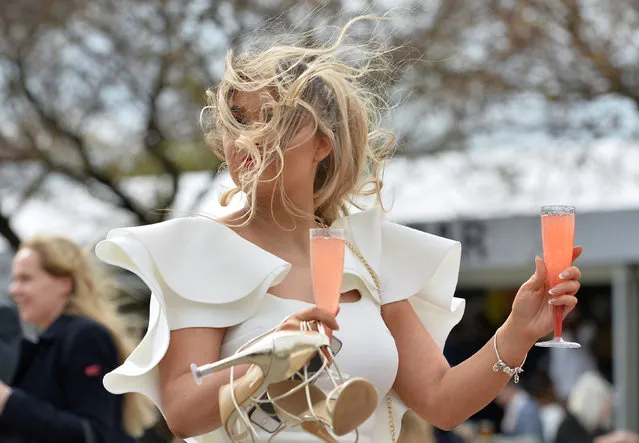 A racegoer on ladies day during the 2.20 Betway Top Novices' Hurdle at the Grand National Horse Racing Festival at Aintree Racecourse, near Liverpool, England on April 5, 2019. (Photo by Peter Powell/Reuters)