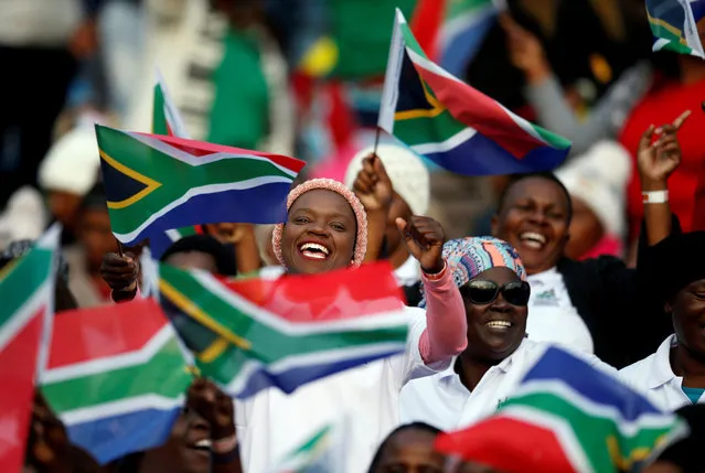 Guests sing as they arrive for the inauguration of Cyril Ramaphosa as President, at Loftus Versveld stadium in Pretoria, South Africa, May 25, 2019. (Photo by Siphiwe Sibeko/Reuters)