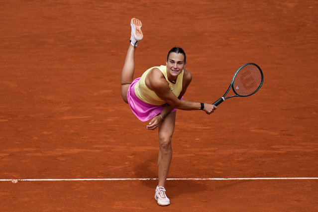 Aryna Sabalenka, of Belarus,  returns the ball to Magda Linette, of Poland, during the Mutua Madrid Open tennis tournament in Madrid, Friday, April 26, 2024. (Photo by Manu Fernandez/AP Photo)