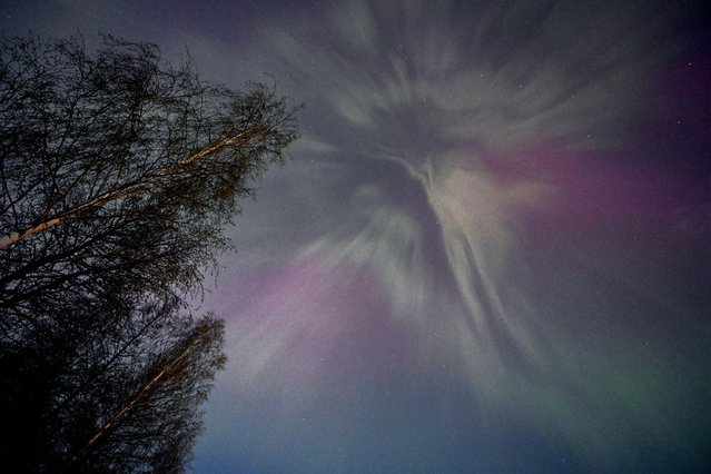 The Aurora Borealis, also known as the Northern Lights illuminate the sky in Espoo, Finland on May 10, 2024. (Photo by Heikki Saukkomaa/Lehtikuva via AFP Photo)