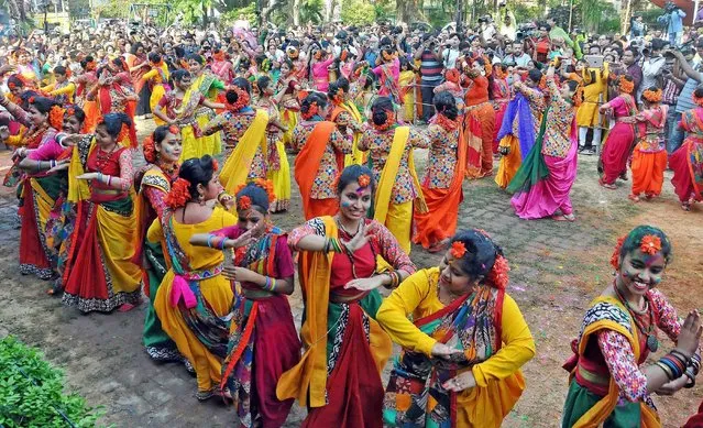 Students in traditional attire take part in “Basant Utsav”, in Kolkata, India on Sunday, March 12, 2017. (Photo by Kol-Monojit Kumar Saha/PTI Photo)