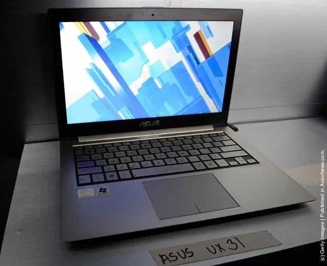 An Asus UX31 Ultrabook is displayed during a press event by Intel Corp. at The Venetian for the 2012 International Consumer Electronics Show