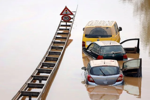 After the flood disaster the clean-up work continues in the Erftkreis, west of North Rhine-Westphalia, Germany on July 20, 2021. Sonar, Bundeswehr tanks and divers are also used to rescue the destroyed cars in Erftstadt-Liblar. (Photo by Christoph Hardt/Imago)