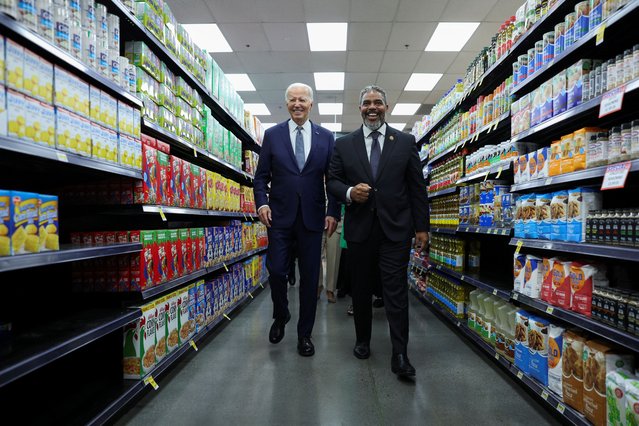 U.S. President Joe Biden walks through an aisle as he makes a stop at a grocery store in Las Vegas, Nevada, U.S., July 16, 2024. (Photo by Tom Brenner/Reuters)