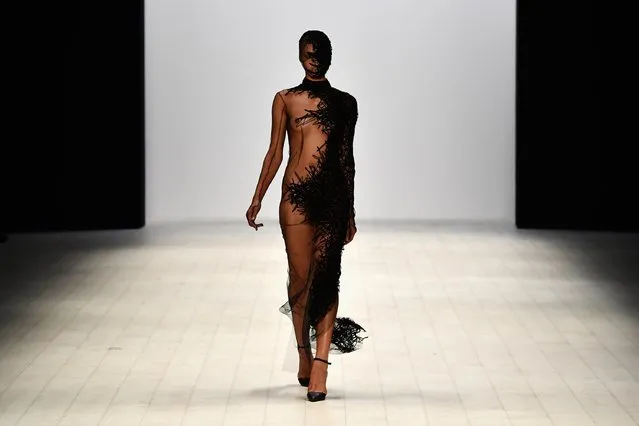 A model walks the runway in a design by Ipsen at the The Innovators: Fashion Design Studio show at Mercedes-Benz Fashion Week Resort 17 Collections at Carriageworks on May 20, 2016 in Sydney, Australia. (Photo by Stefan Gosatti/Getty Images)