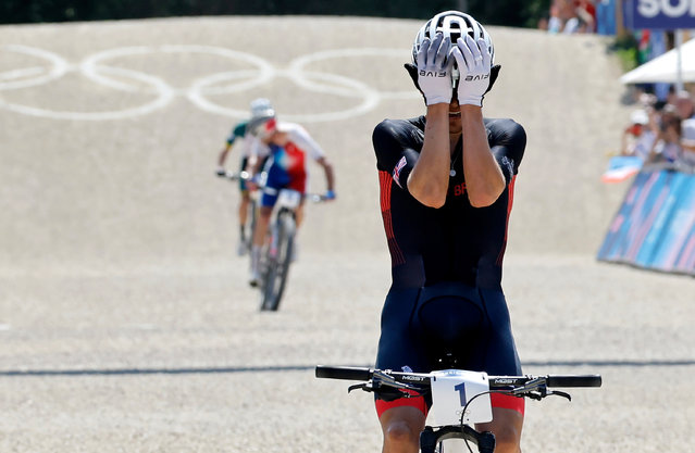 Thomas Pidcock of Great Britain wins the Men Cross Country race of the Mountain Biking competitions in the Paris 2024 Olympic Games, at the Elancourt Hill, Paris, France, 29 July 2024. (Photo by Tolga Akmen/EPA/EFE)