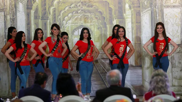 Participants wait for judges to determine the winner of Miss Iraq during the final round of judging in Baghdad,Iraq May 25, 2017. (Photo by Thaier Al-Sudani/Reuters)