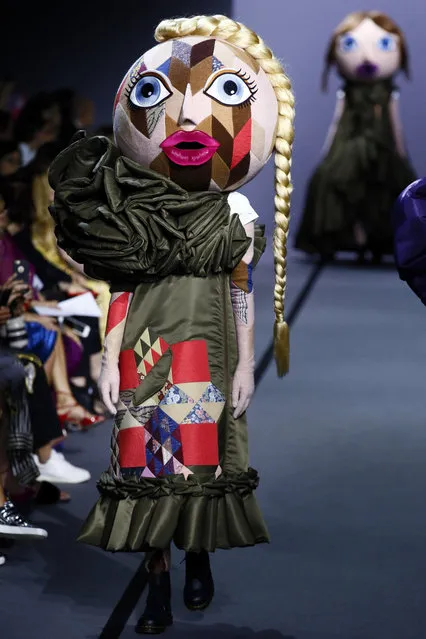 A model wears a creation for Viktor and Rolf's Haute Couture Fall/Winter 2017/2018 fashion collection presented in Paris, Wednesday, July 5, 2017. (Photo by Francois Mori/AP Photo)