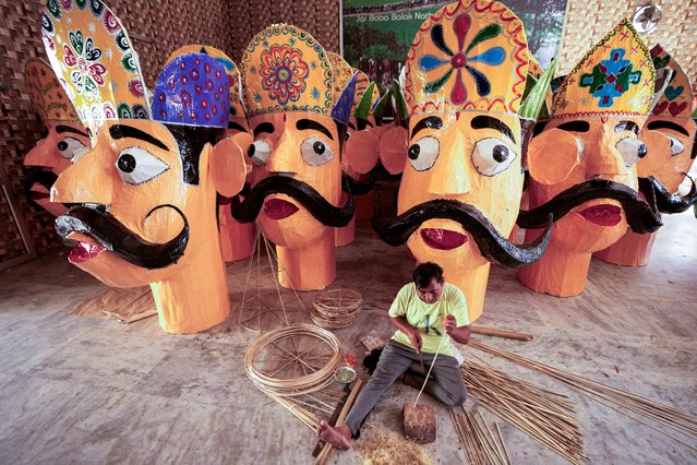 An Indian artist makes effigies of the antagonists in the Hindu epic Ramayana, Ravana, Meghnath and Kumbhkaran in preparation for the upcoming Dussehra festival in Jammu, India, Monday, October 7, 2024. (Photo by Channi Anand/AP Photo)