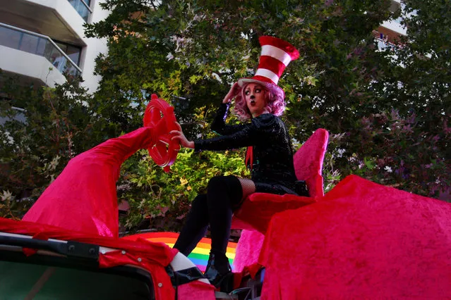 A parade goer sits atop a float on Oxford Street during the 2020 Sydney Gay & Lesbian Mardi Gras Parade on February 29, 2020 in Sydney, Australia. (Photo by Lisa Maree Williams/Getty Images)