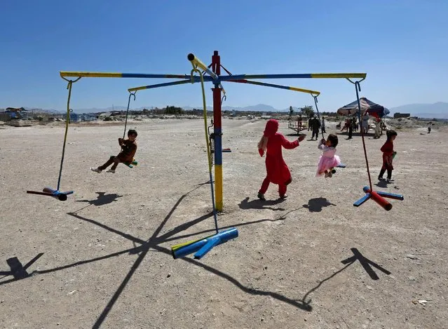 Afghan children ride on swings during the first day of the Muslim holiday of Eid al-Fitr, which marks the end of the holy month of Ramadan, in Kabul, Afghanistan July 6, 2016. (Photo by Omar Sobhani/Reuters)