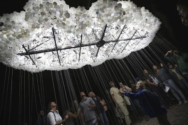 An installation of Canadian artists Caitlind Brown and Wayne Garrett is displayed during the Lumina Light Festival in Cascais September 14, 2014. Lumina Light Festival shows artworks of artists from several countries, which are displayed during a tour around Cascais. (Photo by Rafael Marchante/Reuters)