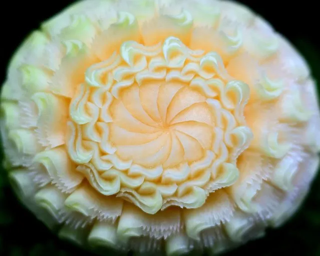 A carved melon is displayed during a fruit and vegetable carving competition at the 26th Thailand International Culinary Cup in Bangkok on September 21, 2022. (Photo by Manan Vatsyayana/AFP Photo)