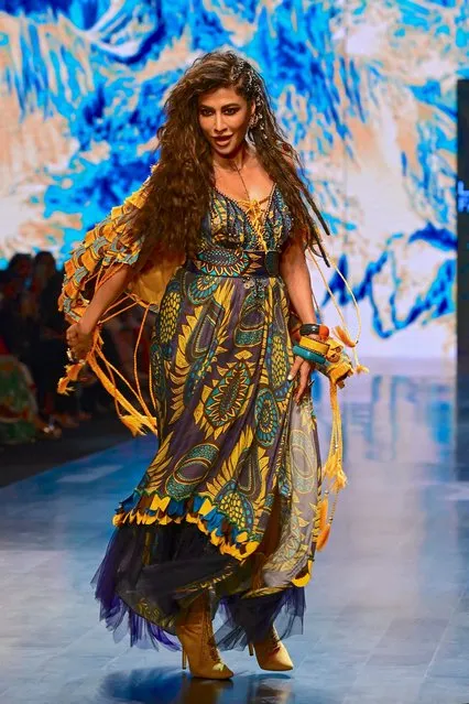 Bollywood actress Chitrangda Singh presents a creation by designer Eshaa Amin during the FDCI X Lakme Fashion Week in Mumbai on October 14, 2022. (Photo by Sujit Jaiswal/AFP Photo)