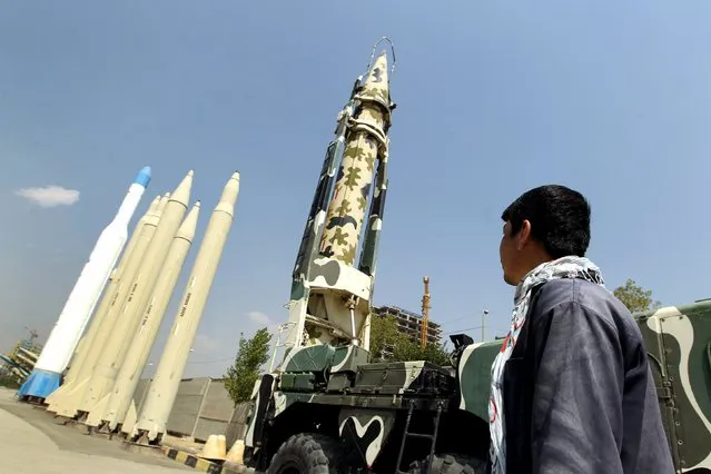 A man looks at Iranian-made missiles at Holy Defence Museum in Tehran September 23, 2015. (Photo by Raheb Homavandi/Reuters/TIMA)