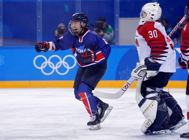 Kim Hee-won of Korea celebrates after Korea scores against goalkeeper Akane Konishi of Japan during the Women's Ice Hockey Preliminary Round Group B game between Korea and Japan on day five of the PyeongChang 2018 Winter Olympics at Kwandong Hockey Centre on February 14, 2018 in Gangneung, South Korea. (Photo by Brian Snyder/Reuters)