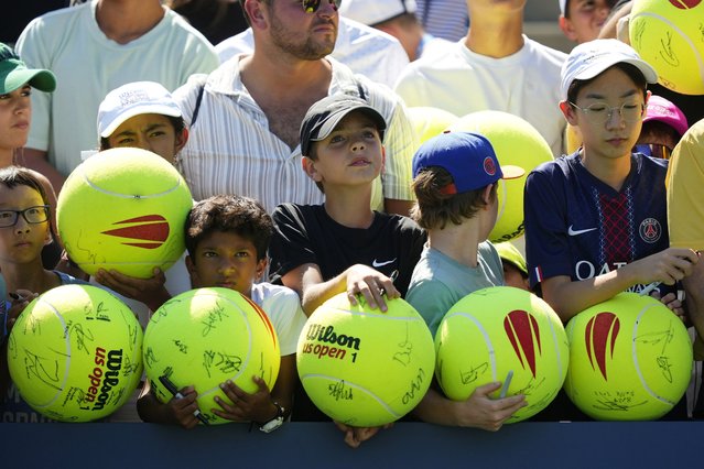 Tennis fans wait for autographs after a match between Joao Fonseca, of Brazil, and Miomir Kecmanovic, of Serbia, during the first round of the US Open tennis championships, Monday, August 25, 2025, in New York. (Photo by Yuki Iwamura/AP Photo)