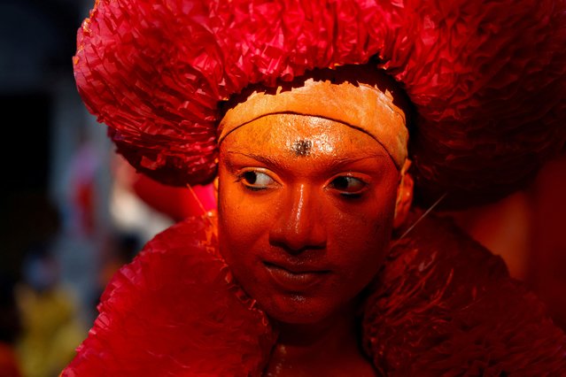 A Hindu devotee looks on after applying paint to his body to celebrate the Lal Kach festival in Munshiganj, Bangladesh, on April 13, 2025. (Photo by Mohammad Ponir Hossain/Reuters)