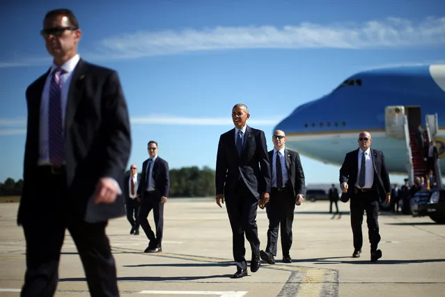 U.S. President Barack Obama arrives at Piedmont Triad International Airport in Greensboro, North Carolina, U.S. October 11, 2016. (Photo by Carlos Barria/Reuters)