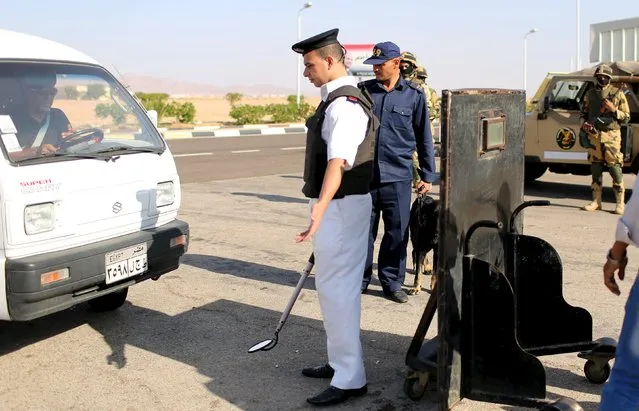 Police inspects cars going into the airport of the Red Sea resort of Sharm el-Sheikh, November 7, 2015. (Photo by Asmaa Waguih/Reuters)