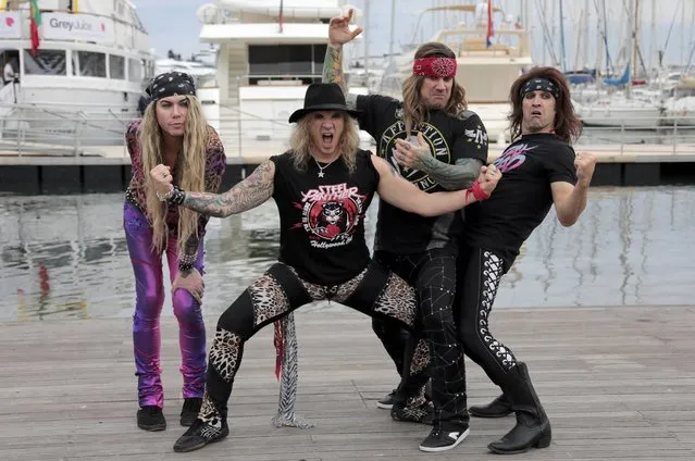 Steel Panther bandmates Michael Starr, Satchel, Lexxi Foxx and Stix Zadinia pose during a photocall for the “Steel Panther” television series project during the annual MIPCOM television programme market in Cannes, France, October 17, 2016. (Photo by Eric Gaillard/Reuters)