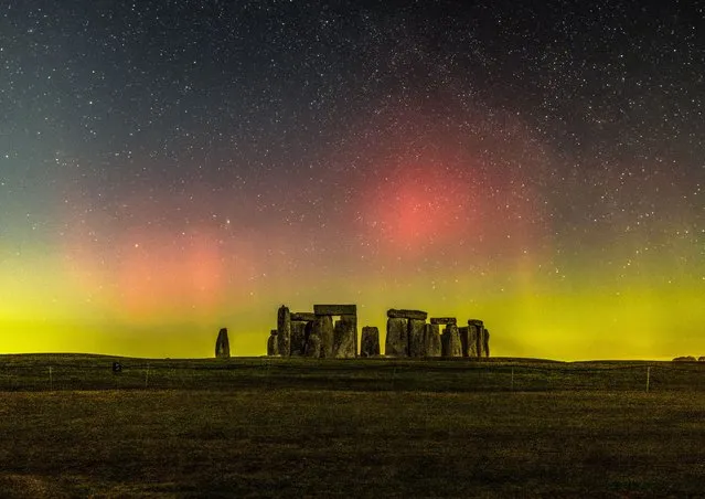 The northern lights over Stonehenge in Wiltshire, United Kingdom on February 26, 2023. (Photo by Nick Bull/Picture Exclusive)