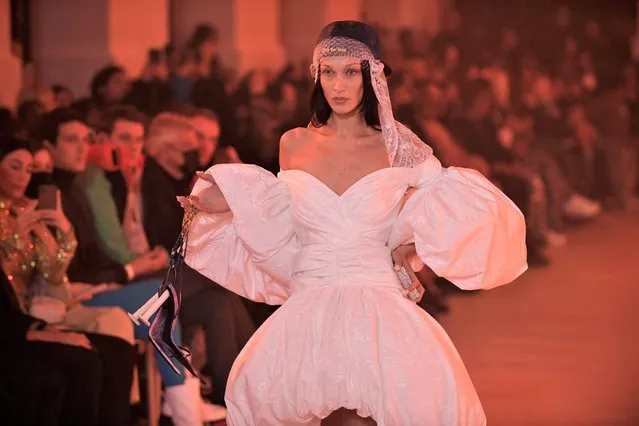 US model Bella Hadid presents a creation during the Women's Fall/Winter 2022/2023 Ready-to-Wear Off-White collection show during the Paris Fashion Week in Paris, on February 28, 2022. (Photo by Julien de Rosa/AFP Photo)