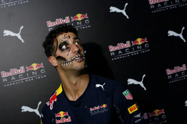 Red Bull Formula One driver Daniel Ricciardo of Australia, with his face painted as a “Calavera” or skull, reacts during a news conference in Mexico City, Mexico, October 26, 2016. (Photo by Carlos Jasso/Reuters)