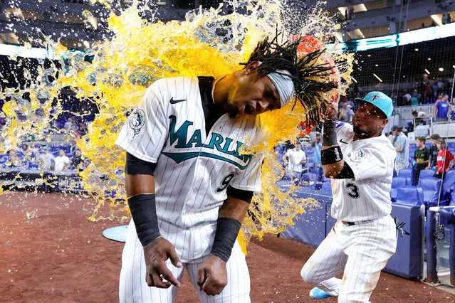Luis Arraez #3 of the Miami Marlins gives teammate Jean Segura #9 a Gatorade bath after defeating the Chicago Cubs at loanDepot park on April 28, 2023 in Miami, Florida. (Photo by Megan Briggs/Getty Images)