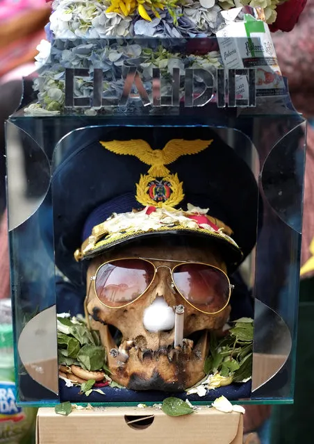 A skull is seen at a cemetery during the Day of Skulls in La Paz, Bolivia, November 8, 2016. (Photo by David Mercado/Reuters)