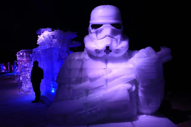 An ice-sculptures in the form of a Stormtrooper from the Star Wars series is displayed during the Star Wars Ice-sculpture festival in Liege on December 16, 2015.
The wait is finally over. “Star Wars: The Force Awakens” opens in cinemas in France, South Africa and several other countries, with fans giving their first reaction to the latest episode of the space saga. (Photo by John Thys/AFP Photo)