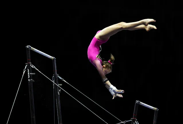 Baylie Belman #21 competes in the Uneven Bars prior to the Nastia Liukin Cup at Indiana Convention Center on February 26, 2021 in Indianapolis, Indiana. (Photo by Jamie Squire/Getty Images)