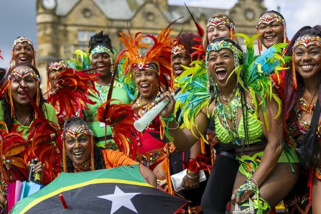 Performers light up Harrogate carnival in England on July 29, 2023. It kicked off with a street parade through the town centre before heading to the Valley Gardens. (Photo by James Glossop/The Tines)