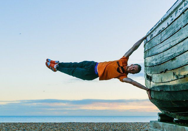 Brighton pier yoga. (Photo by Kristina Kashtanova/Caters News)