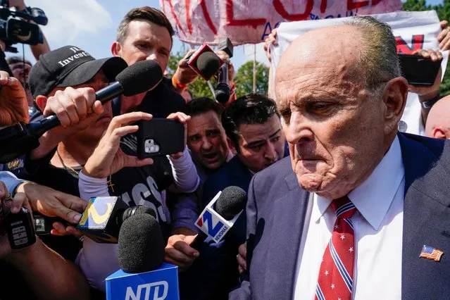 Rudy Giuliani speaks outside the Fulton County jail, Wednesday, August 23, 2023, in Atlanta. Giuliani has surrendered to authorities in Georgia to face an indictment alleging he acted as former President Donald Trump's chief co-conspirator in a plot to subvert the 2020 election. (Photo by Brynn Anderson/AP Photo)