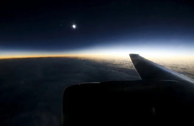 A view from a plane during the so-called “Eclipse Flight” from the Russian city of Murmansk to observe the solar eclipse above the neutral waters of the Norwegian Sea, March 20, 2015. (Photo by Sergei Karpukhin/Reuters)
