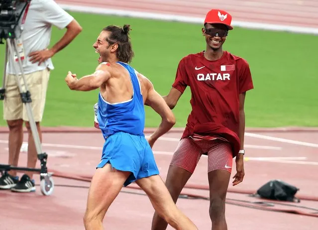 Gianmarco Tamberi of Italy and Mutaz Essa Barshim of Qatar share the Gold Medal in the Men's High Jump Final on day nine of the athletics events of the Tokyo 2020 Olympic Games at Olympic Stadium on August 1, 2021 in Tokyo, Japan. (Photo by Jean Catuffe/Getty Images)