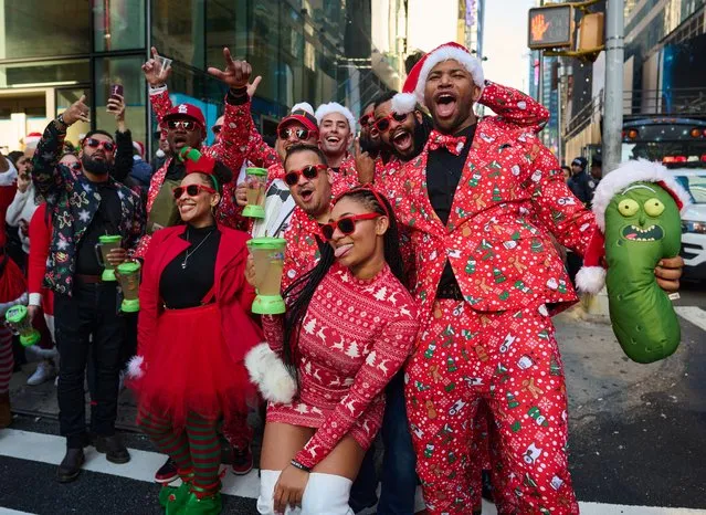 The annual Santacon pub crawl tradition where all the participants have to dress in a Christmas themed costume returns to New York City for its 25th year on December 9, 2023. (Photo by Edna Leshowitz/ZUMA Press Wire/Rex Features/Shutterstock)
