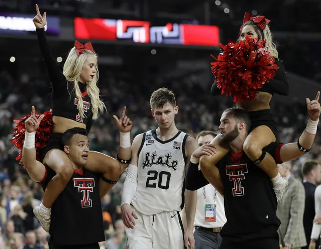 Michigan State's Matt McQuaid (20) leaves the court after the team's 61-51 loss to Texas Tech in the semifinals of the Final Four NCAA college basketball tournament, Saturday, April 6, 2019, in Minneapolis. (Photo by David J. Phillip/AP Photo)