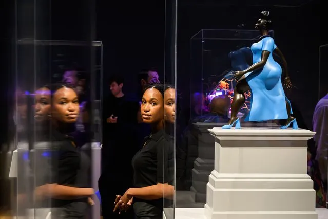 The US artist Tschabalala Self stands with a scale model of her work “Lady in Blue” at the announcement of the shortlist for the next fourth plinth commission at the National Gallery, on February 19, 2024 in London, England. The artworks set to grace Trafalgar Square in 2026 and 2028 are carefully selected by the Fourth Plinth Commissioning Group, an independent panel comprising artists, journalists, and curators. (Photo by Leon Neal/Getty Images)