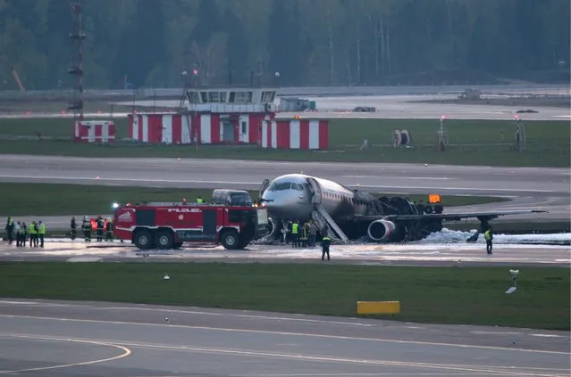 An Aeroflot Sukhoi Superjet-100 (SSJ100) passenger aircraft after crashlanding at Sheremetyevo Airport; the airliner left Sheremetyevo at around 6pm Moscow time for Murmansk, returned and made an emergency landing at around 6.40 Moscow time; the crashlanding and the fire aboard the aircraft have resulted in casualties. (Photo by TASS/AFP Photo)