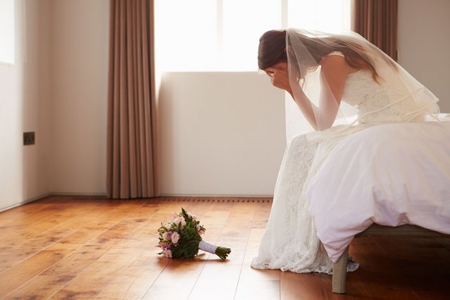 Bride in bedroom having second thoughts before wedding. (Photo by monkeybusinessimages/Getty Images)
