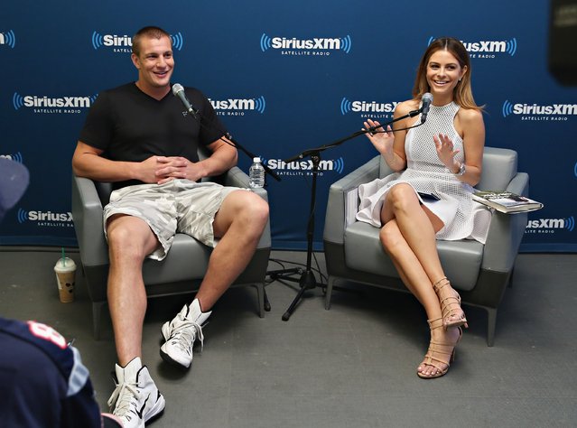 NFL player Rob Gronkowski speaks with TV personality Maria Menounos during SiriusXM's “Town Hall” with Rob Gronkowski hosted by Maria Menounos on July 17, 2015 in New York City. (Photo by Cindy Ord/Getty Images for SiriusXM)